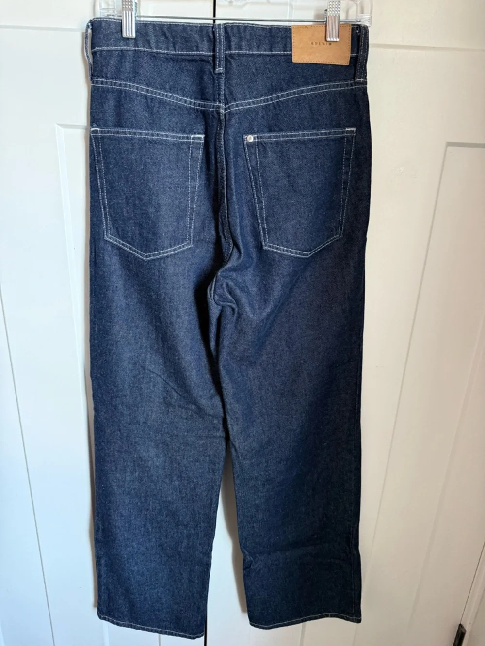 NWOT H&M high rise wide leg jeans in a dark wash color way. Size 8.